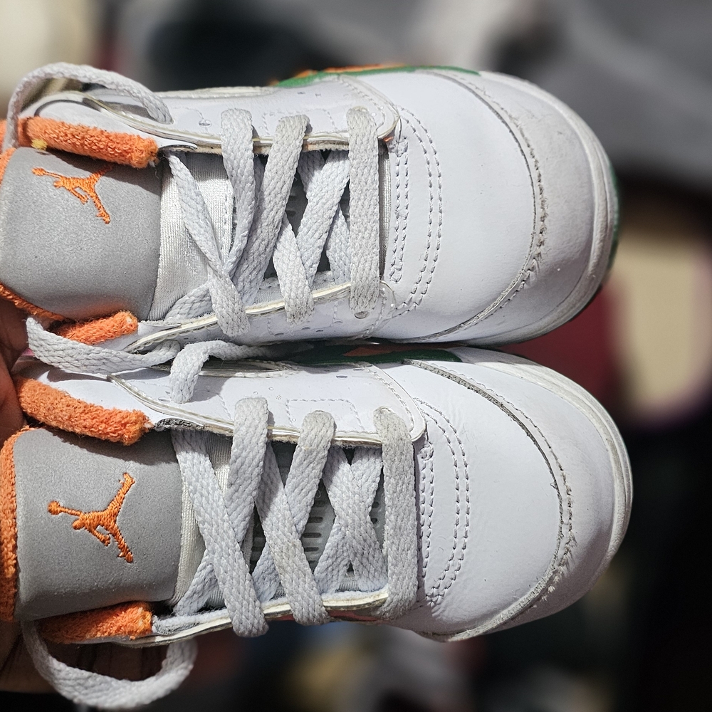 Jordan White and Orange Sneakers with Sleek Design